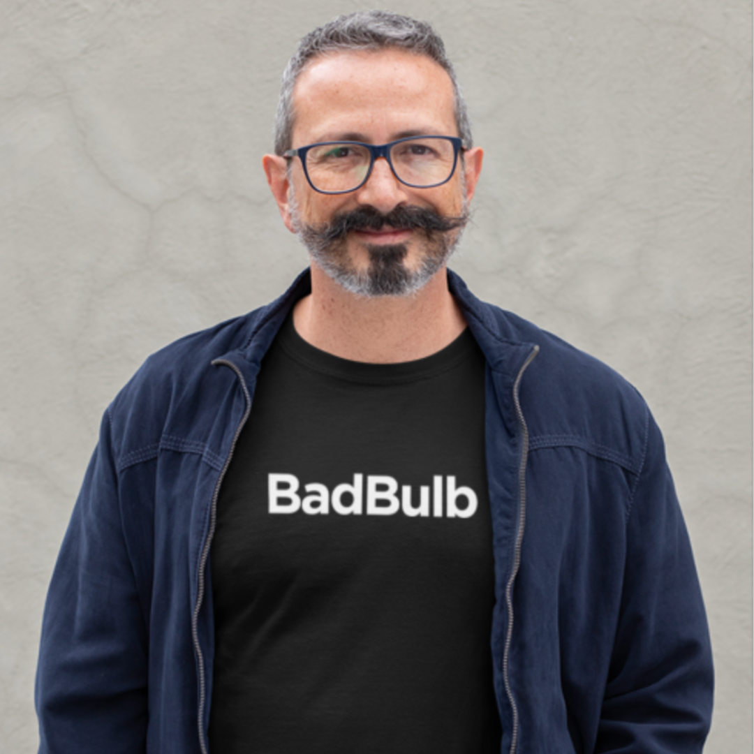 A person wearing the black badbulb T-shirt design.